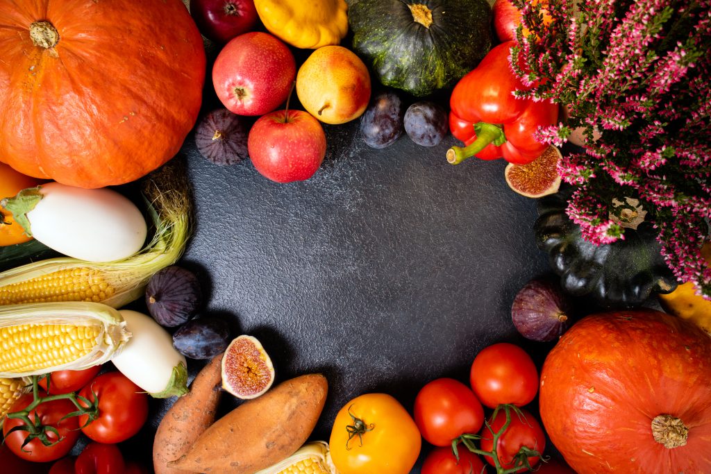 Autumn background with healthy food autumn vegetables and fruits